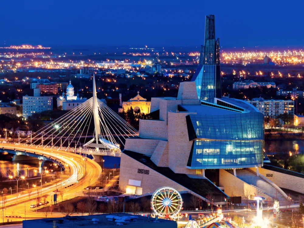 Overhead view of the city lights at Winnipeg, Manitoba, one of the best places to visit in Canada