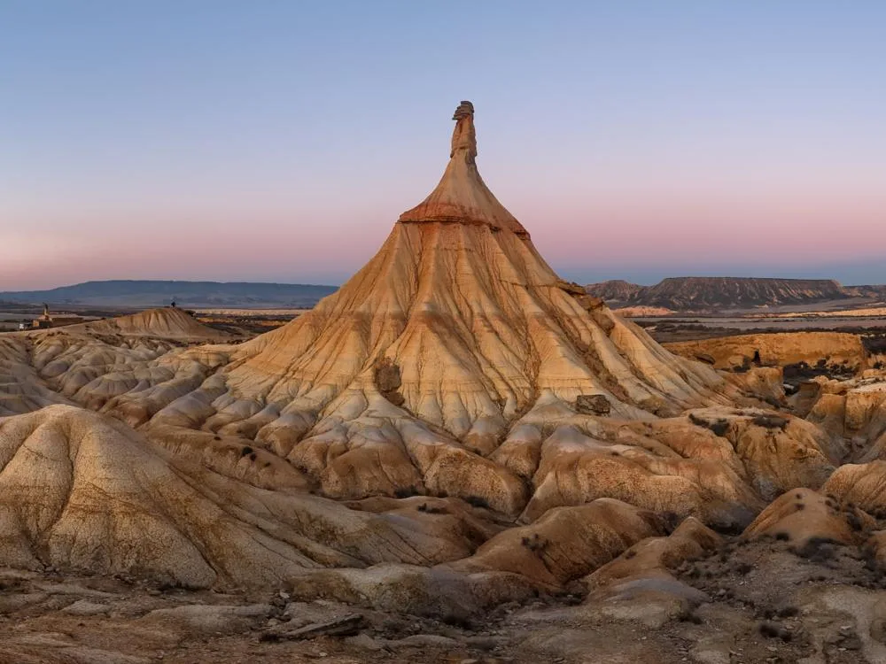 A magnificent natural rock formation at a desert region on Bardenas Reales Natural Park in Spain, one of many Game of Thrones filming locations you can visit