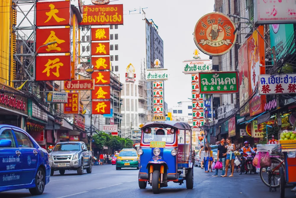 Bustling day in Bangkok pictured with a hazy sky in the background for a piece on the best places to visit in Thailand