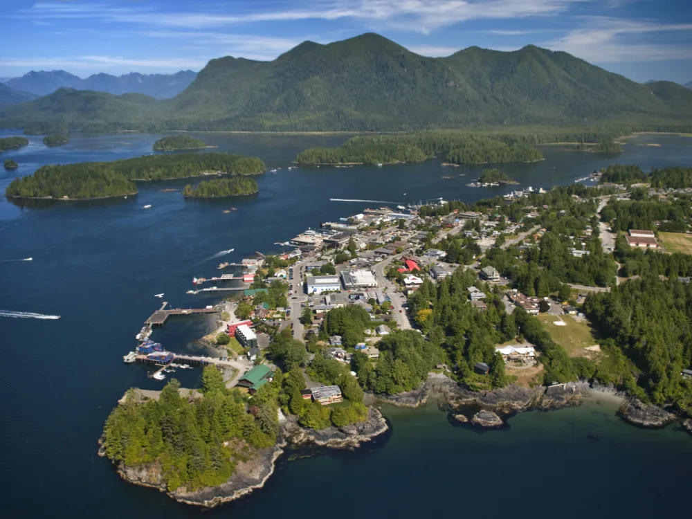 Aerial view of Tofino Downtown and a mountain skyline, in British Columbia, one of the best places to visit in Canada