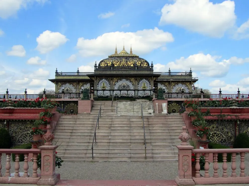 Golden linings and complex printed patterns on walls and roofs of Prabhupada's Palace of Gold, a piece on the best attractions in West Virginia