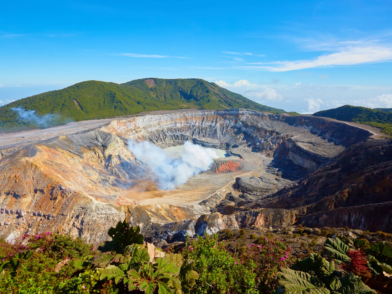 Poas Volcano, one of Costa Rica's best places to visit, seen from the top of the hill