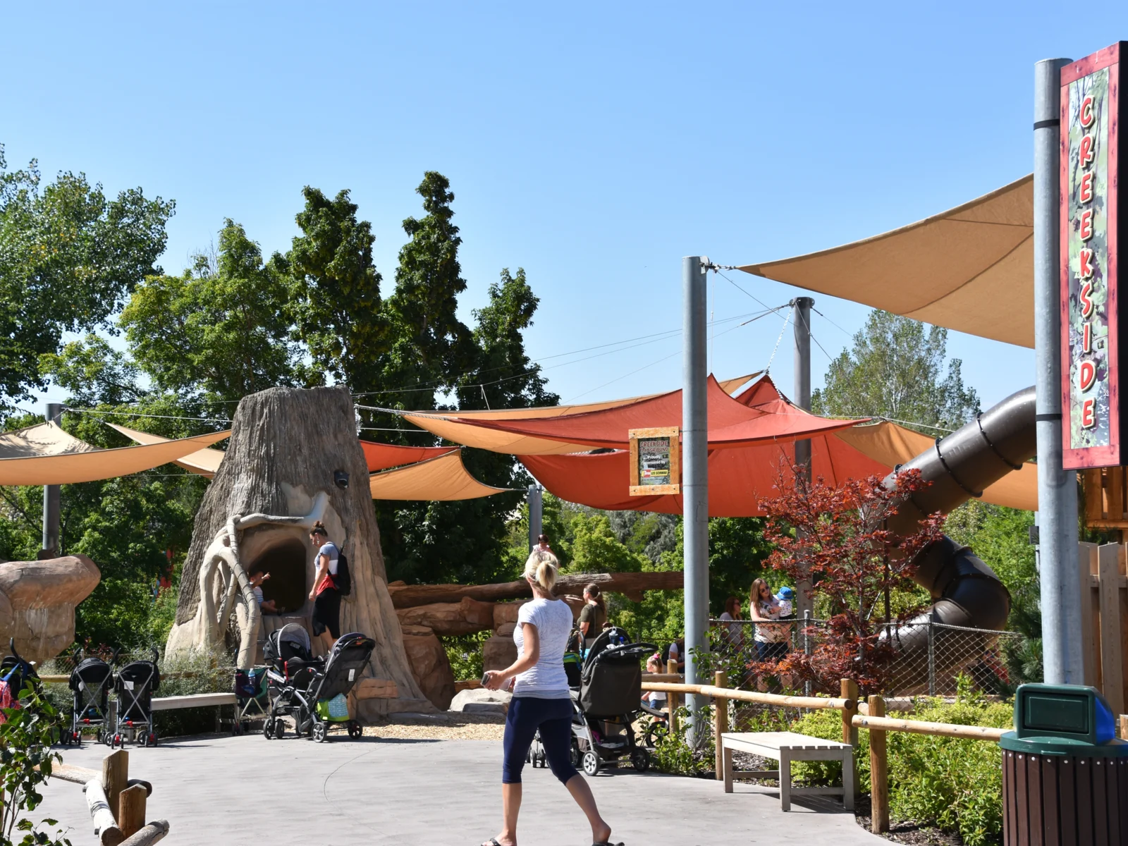 Woman walking at the Hogle Zoo, one of the best places to visit in Utah