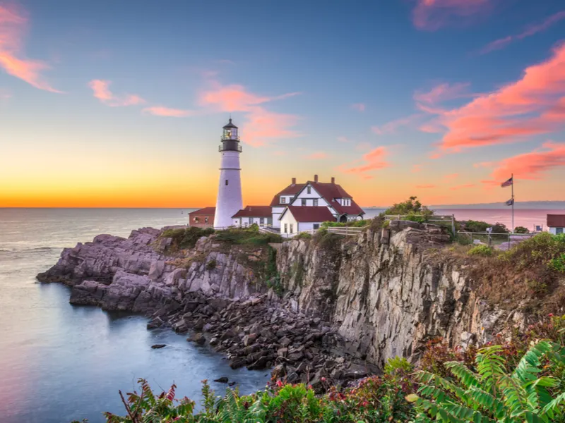 Lighthouse overlooking the ocean in Portland, Maine, one of the best places to visit in New England