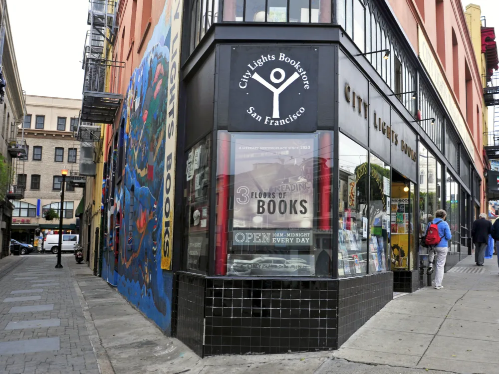 The City Lights Bookstore, tiled as one of the best places to visit in San Francisco, on an acute corner in between two streets famous as an independent bookstore-publisher that published the poem Howl of Allen Ginsberg