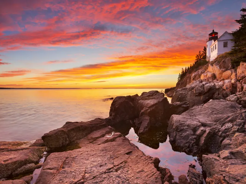 Spectacular view of the Bass Harbor Head lighthouse in Acadia National Park, one of the best places to visit in New England