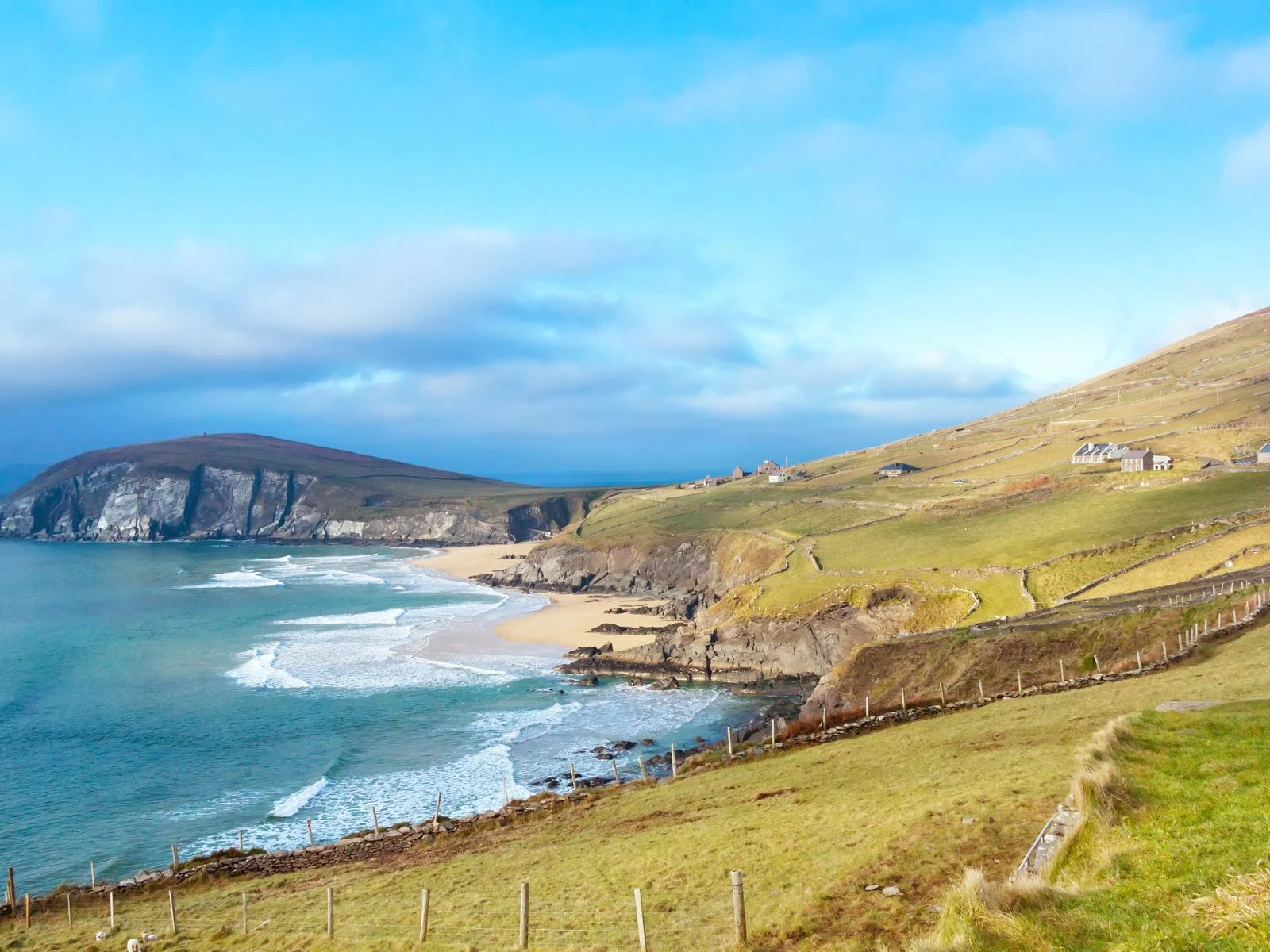 The loney Keem Beach with its small shore and rocky coast, a piece on the best places to visit in Ireland